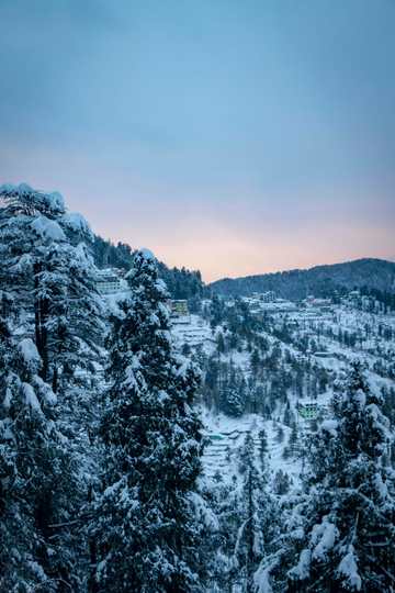 Shimla under fresh snow at dusk