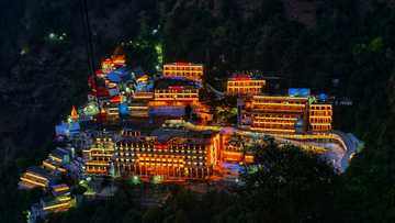 Vaishno Devi Bhawan lit up at night, above Katra
